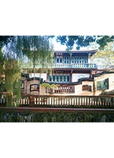 觀稼樓圍繞著楊柳，讓人彷彿置身江南的宅院。之照片