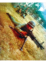 作者張孟侖於民國六十八年入伍接受機槍訓練，之後在軍中服役時曾駐守金門。（圖／張孟侖）之照片